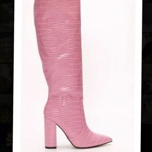 Pink snakeskin tall boots